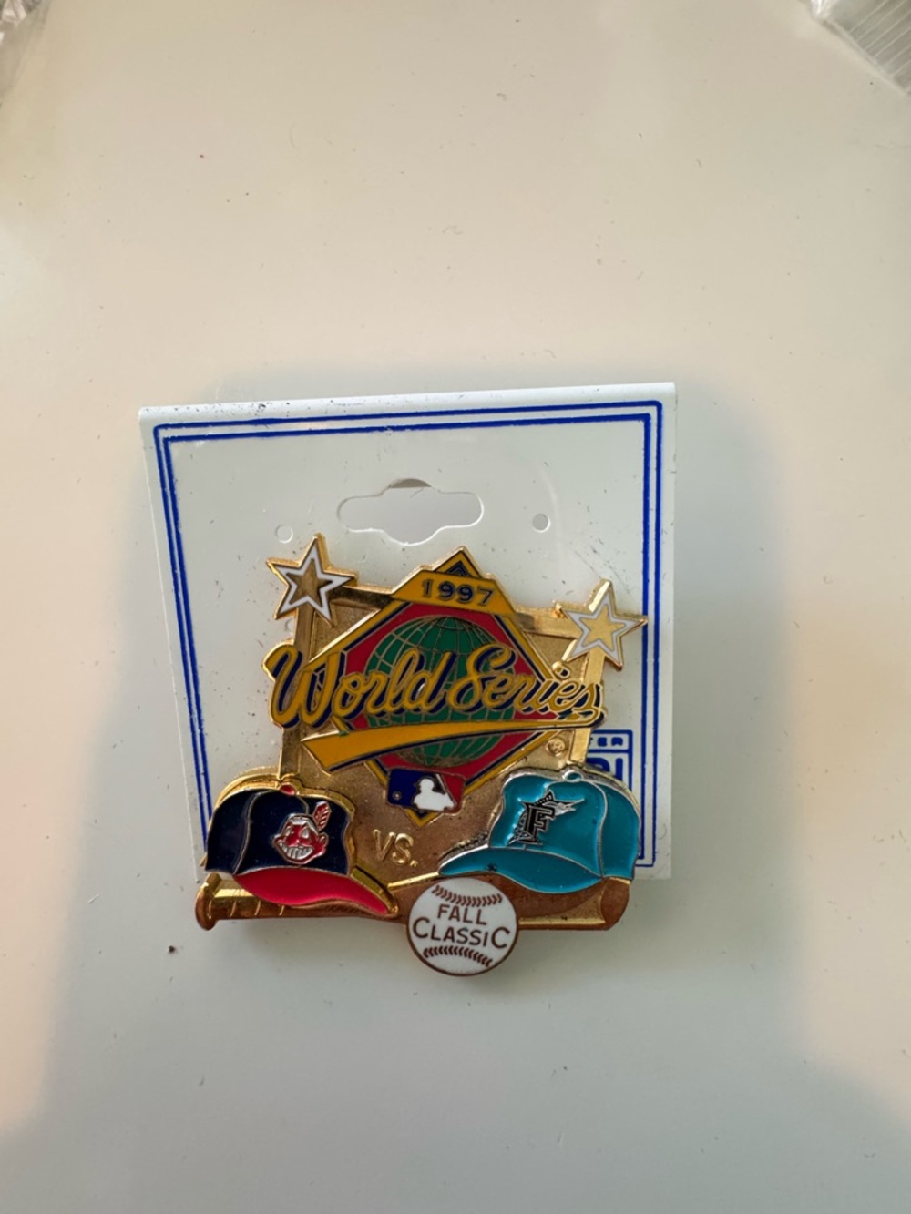 MLB 1997 World Series Gold-Tone Pin with Teal and Navy Caps